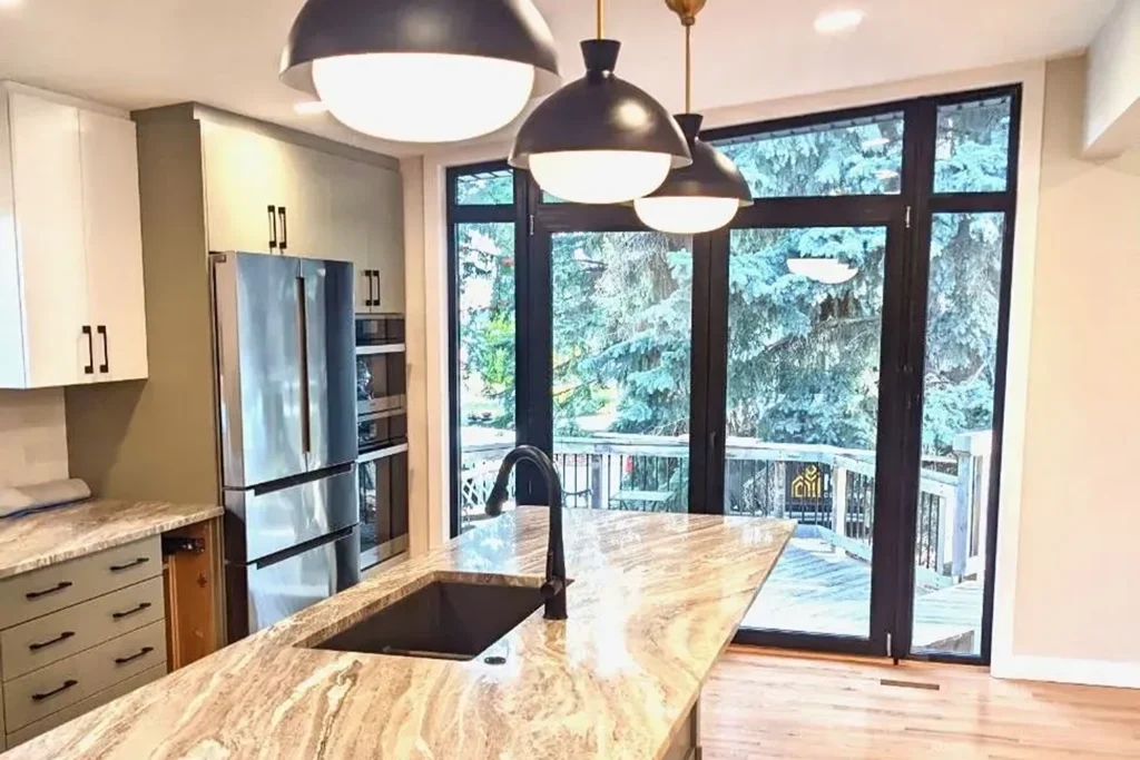 Kitchen renovation in Edmonton Alberta. Modern kitchen island with stone top and open concept