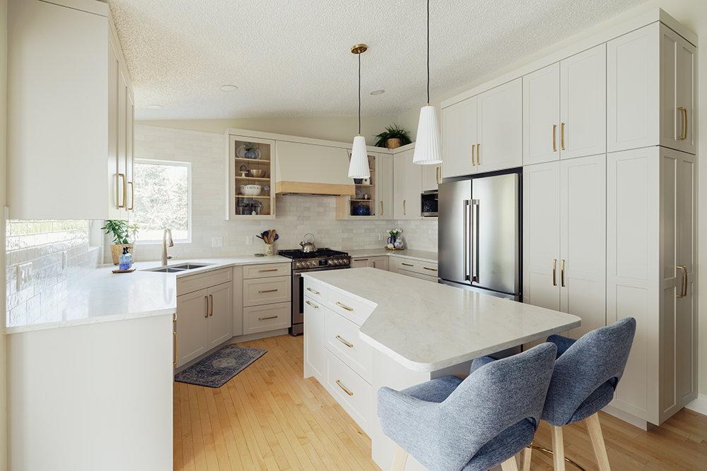 Small kitchen renovation in Edmonton featuring white shaker cabinets and a new open-concept layout