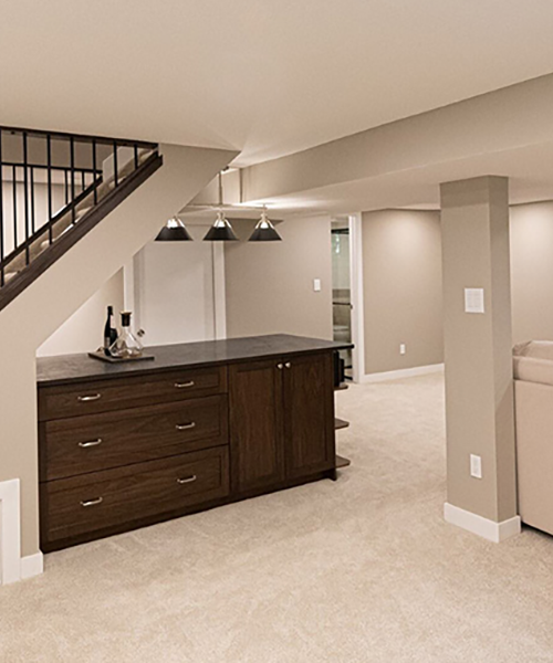 Planning in advance allowed us to creativly utilize this space under the stairs for a bar.